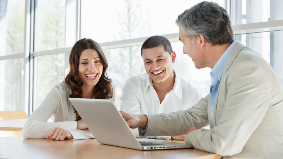 colleagues discussing invoice factoring