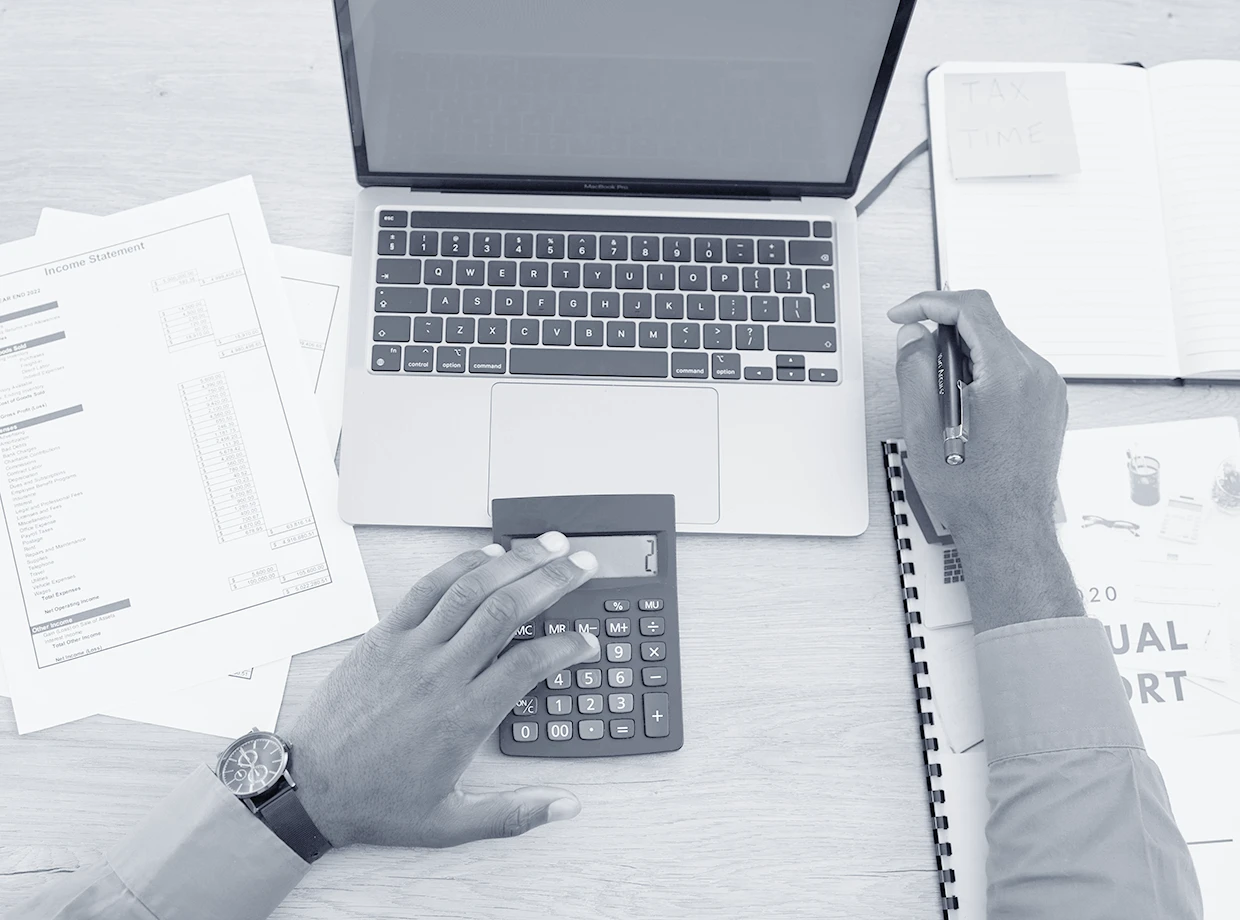 hands-writing-finance-with-calculator-desk-budget-investing-tax-saving-by-blank-laptop-office-financial-advisor-pc-mockup-space-screen-income-expenses-with-banking