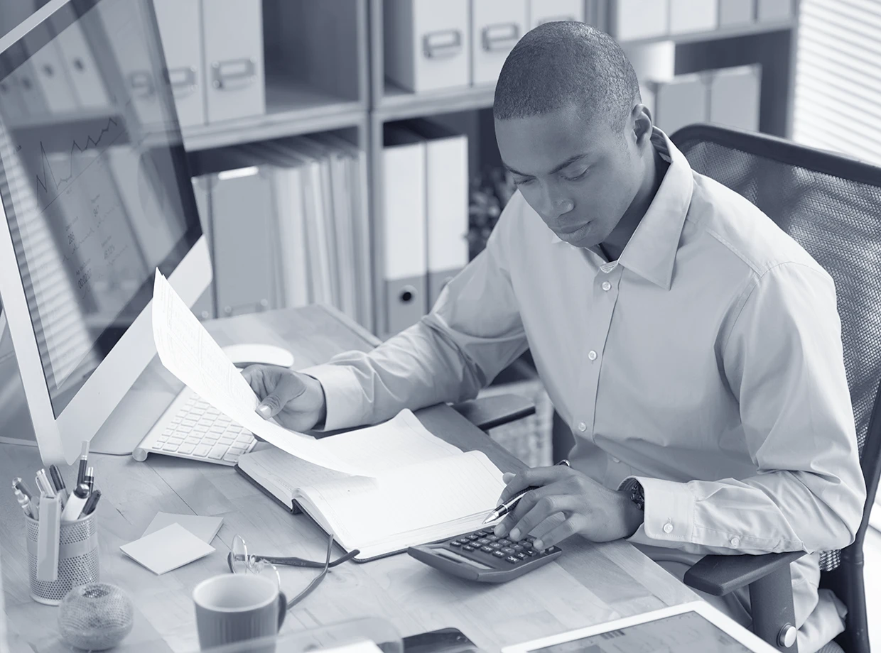 high-angle-view-male-accountant-checking-financial-document